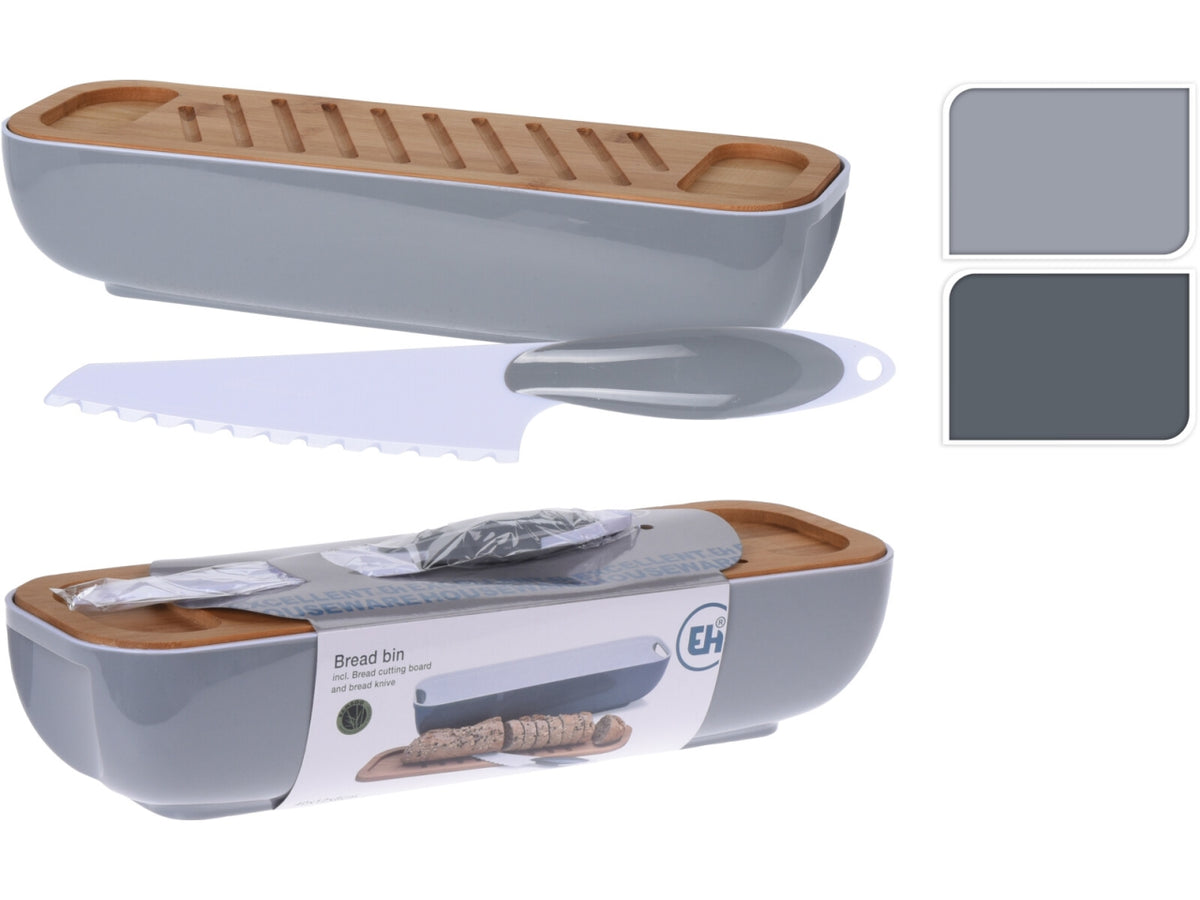 Portapane in PS con coperchio in bambù e coltello in ABS. Colori bicolore in 2 assortimenti. Dimensioni 40x12,5x8,5cm, coltello 27cm, peso 670gr