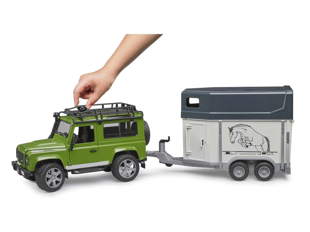 Land rover defender station wagon con rimorchio trasporto con 1 cavallo