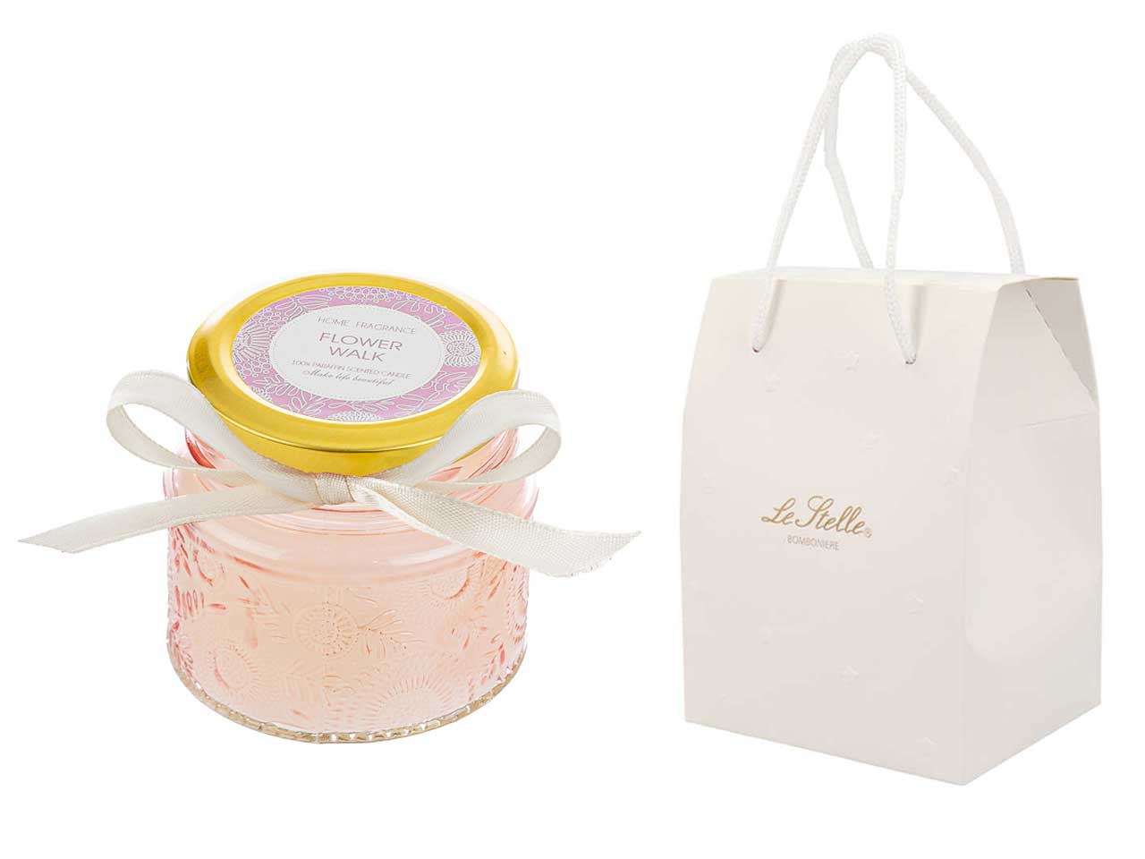 Candela profumata rosa inglese e vaniglia, vasetto in vetro decorato a rilievo rosa con shopper avorio, d.6,5xh.6 cm - Le Stelle