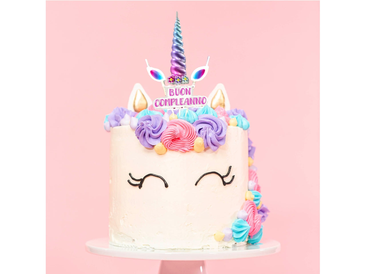 Candela unicorno con corno e scritta buon compleanno