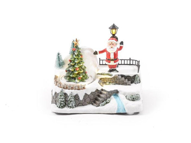 Paesaggio natalizio con musica luci e movimento a batteria misura 18x13x16cm in resina con scatola regalo