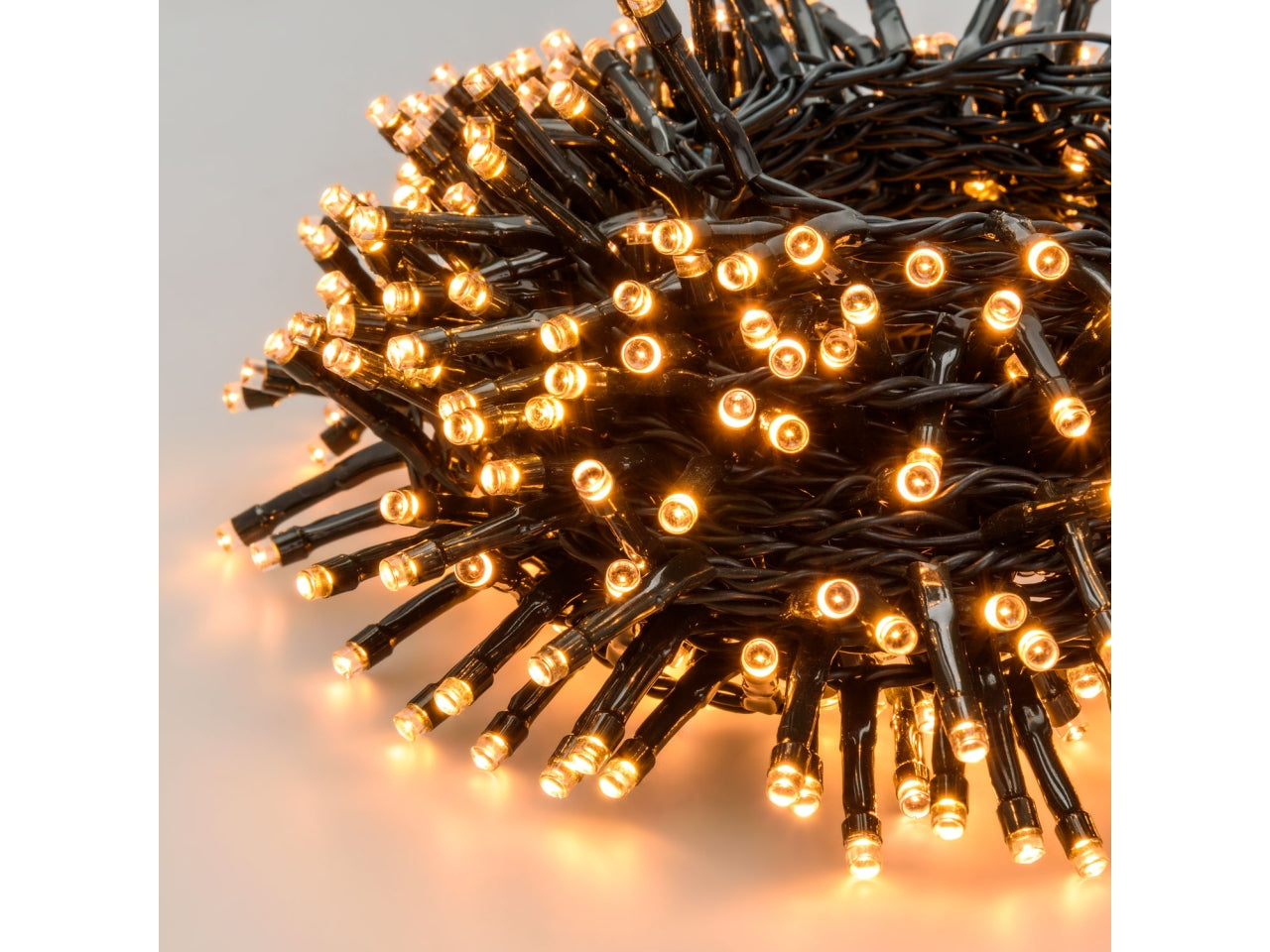 Catena 2000led bianco caldo traditional con 8 giochi di luce, filo verde 4+40,5mt uso interno/esterno