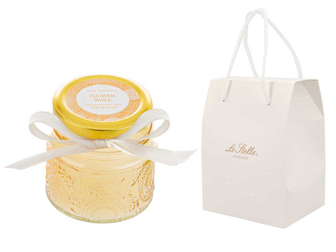 Candela profumata cannella e pepe bianco, vasetto in vetro decorato a rilievo ambra con shopper avorio, d.6,5xh.6 cm - Le Stelle