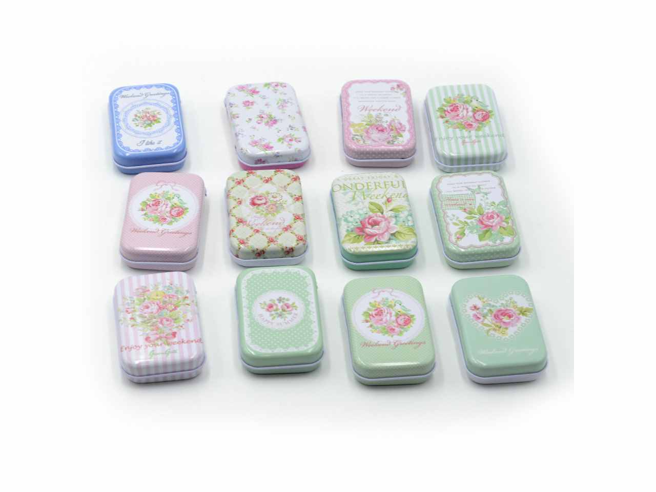 Scatolina in metallo rose 36 pezzi decori assortiti cm7,5x5h2 $