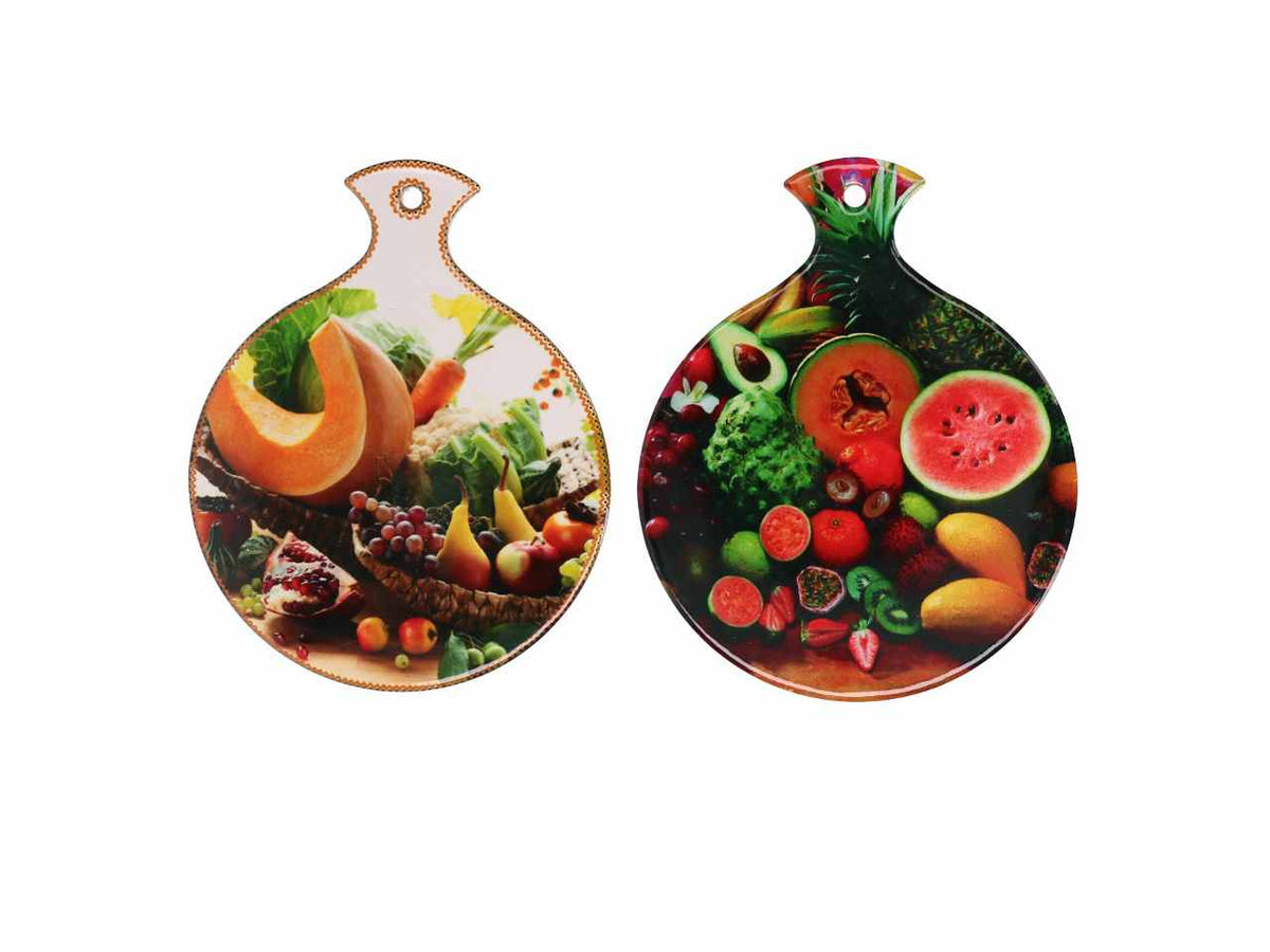 Mattonella in ceramica con fantasia frutta tagliata multicolor forma rotonda in 2 assortimenti 18,7x15xh.0,6cm