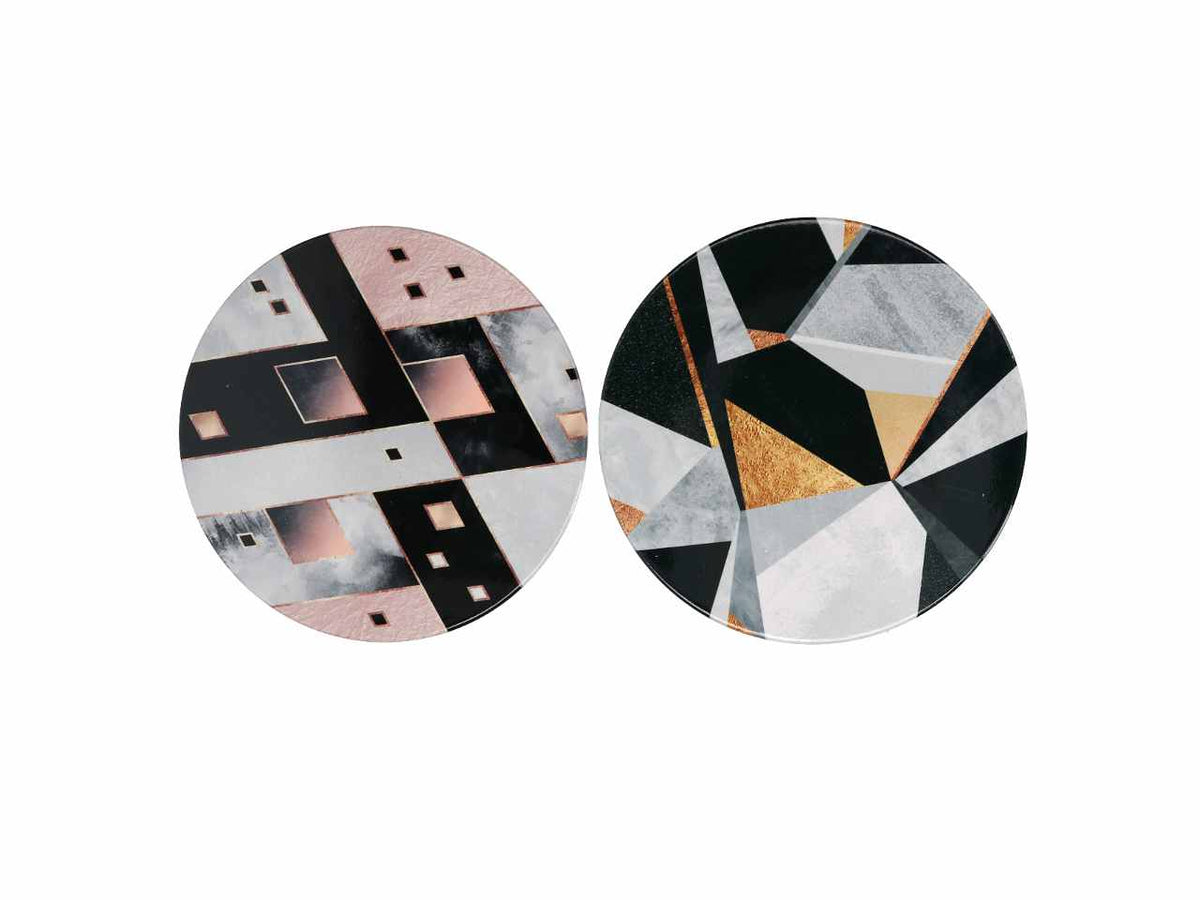 Mattonella in ceramica con sfondo bianco e nero fantasie geometriche e forma rotonda in 2 assortimenti d.20xh0,6cm
