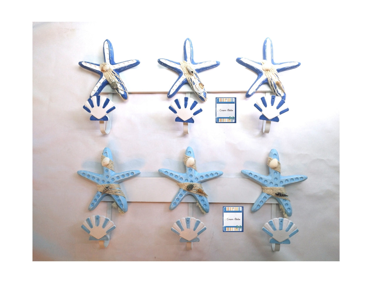 APPENDINO STELLA MARINA CON 3 GANCI A FORMA CONCHIGLIA H.22X50CM IN 2 ASSORTIMENTI