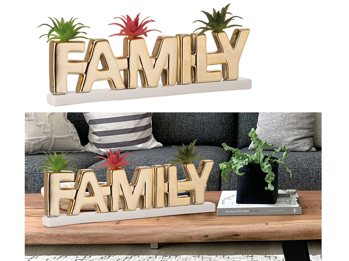 Scritta family gold con piantine