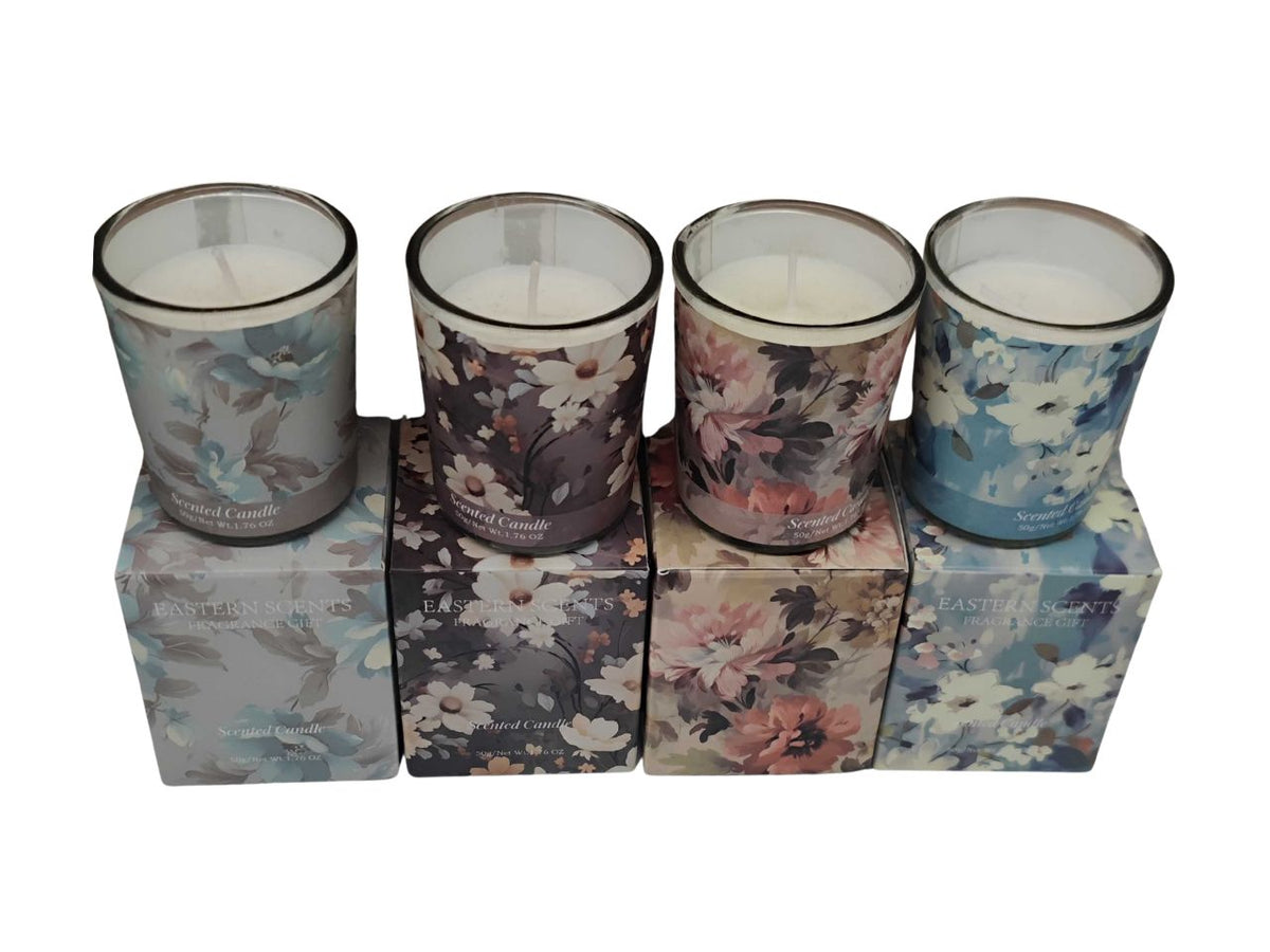 Candela profumata al cotone in barattolo di vetro 5xh.6cm assortite