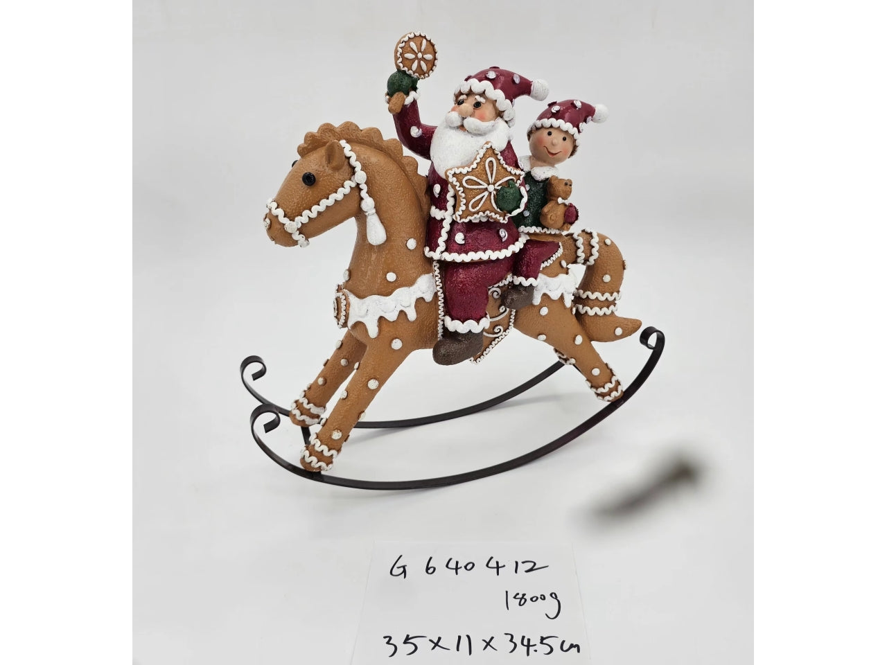Cavallo a dondolo in poliresina con babbo natale 34,5x11x35cm