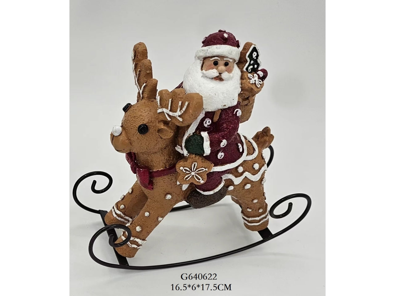 Renna a dondolo in poliresina con babbo natale 17,5x16x6cm