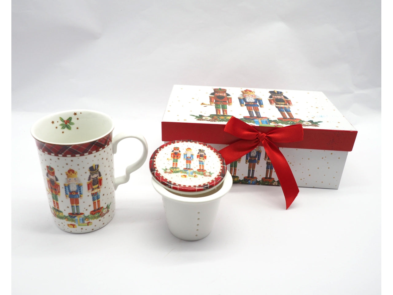 Tisaniera decoro schiaccianoci con filtro in scatola da regalo