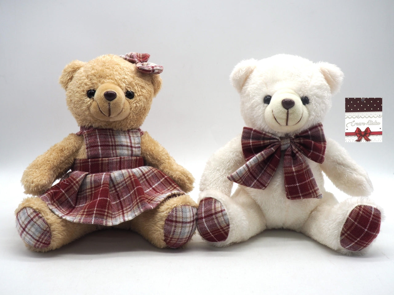 Orsacchiotto peluche 20cm con vestito assortiti
