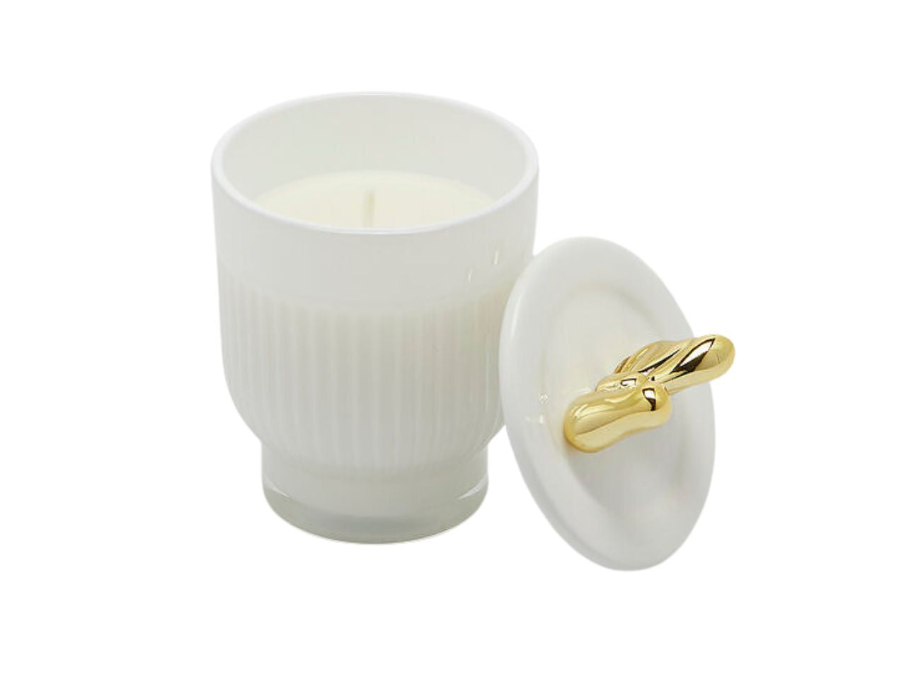 Candela con vasetto in vetro 7xh.11cm e coperchio con fiocco oro, bianca profumata al frangipane