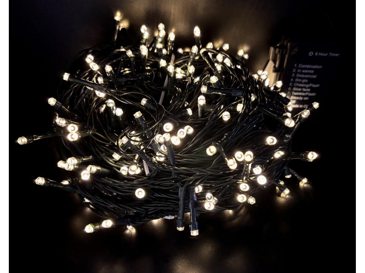 Catena luminosa 300 minilucciole led bianco caldo a batteria, lunghezza 30mt, con giochi di luce e timer per uso interno/esterno
