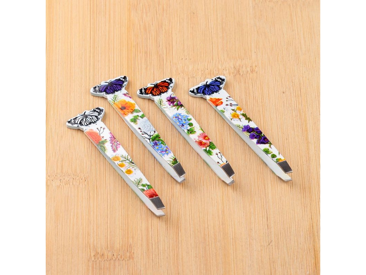 Pinzette per sopracciglia butterfly in metallo, multicolor con decorazione floreale e dettaglio farfalla - Puckator