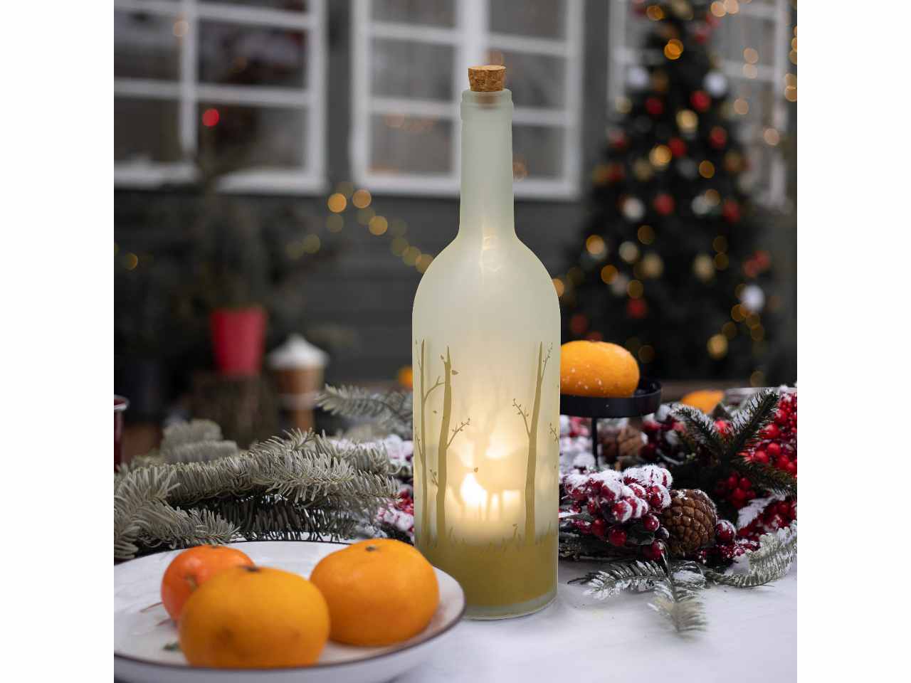Bottiglia cuolpa 9x34cm con renne bianco caldo