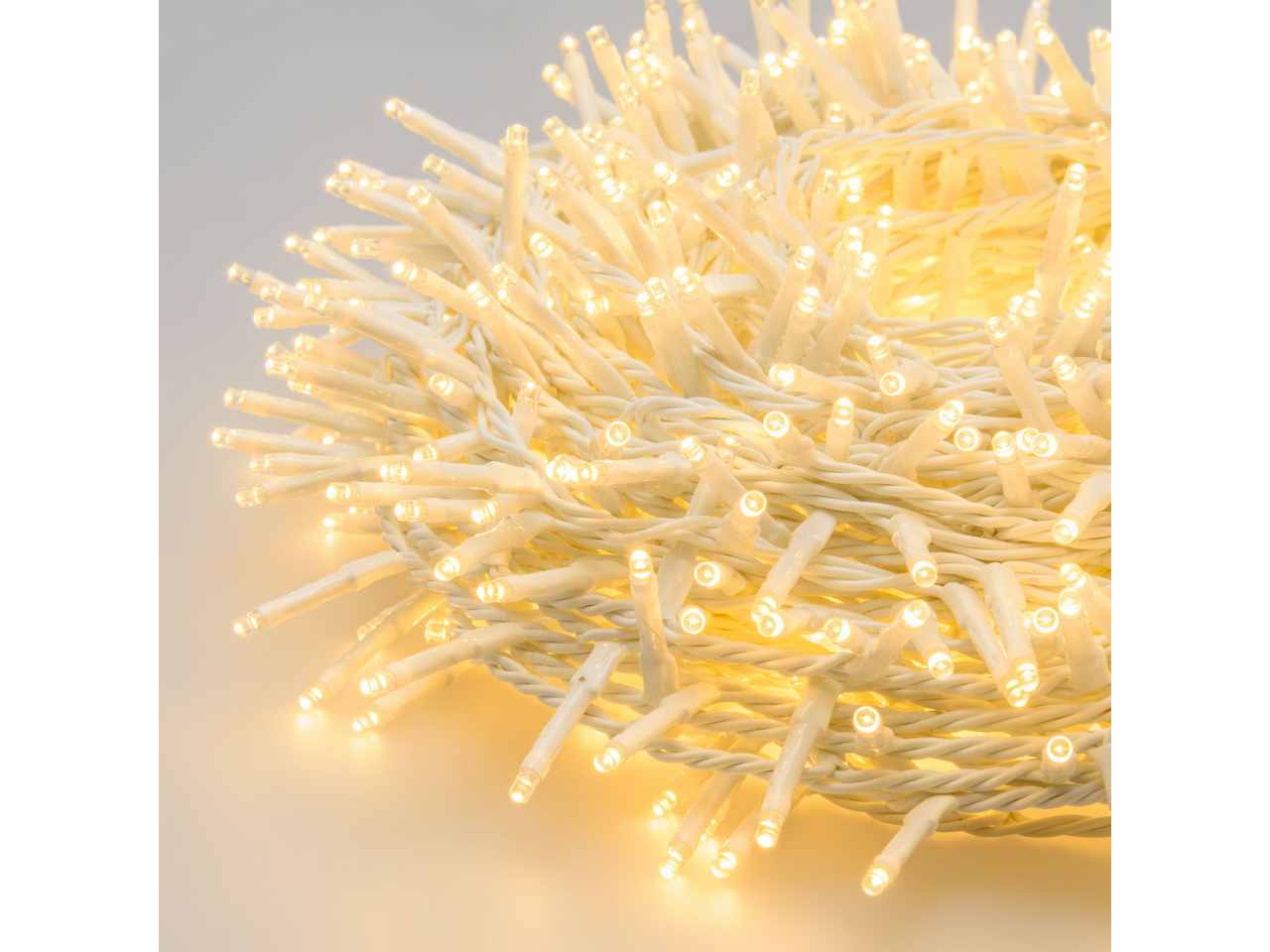 Catena luci 1000 miniled bianco caldo 7 giochi di luce con timer , cavo bianco uso esterno 34,5 metri