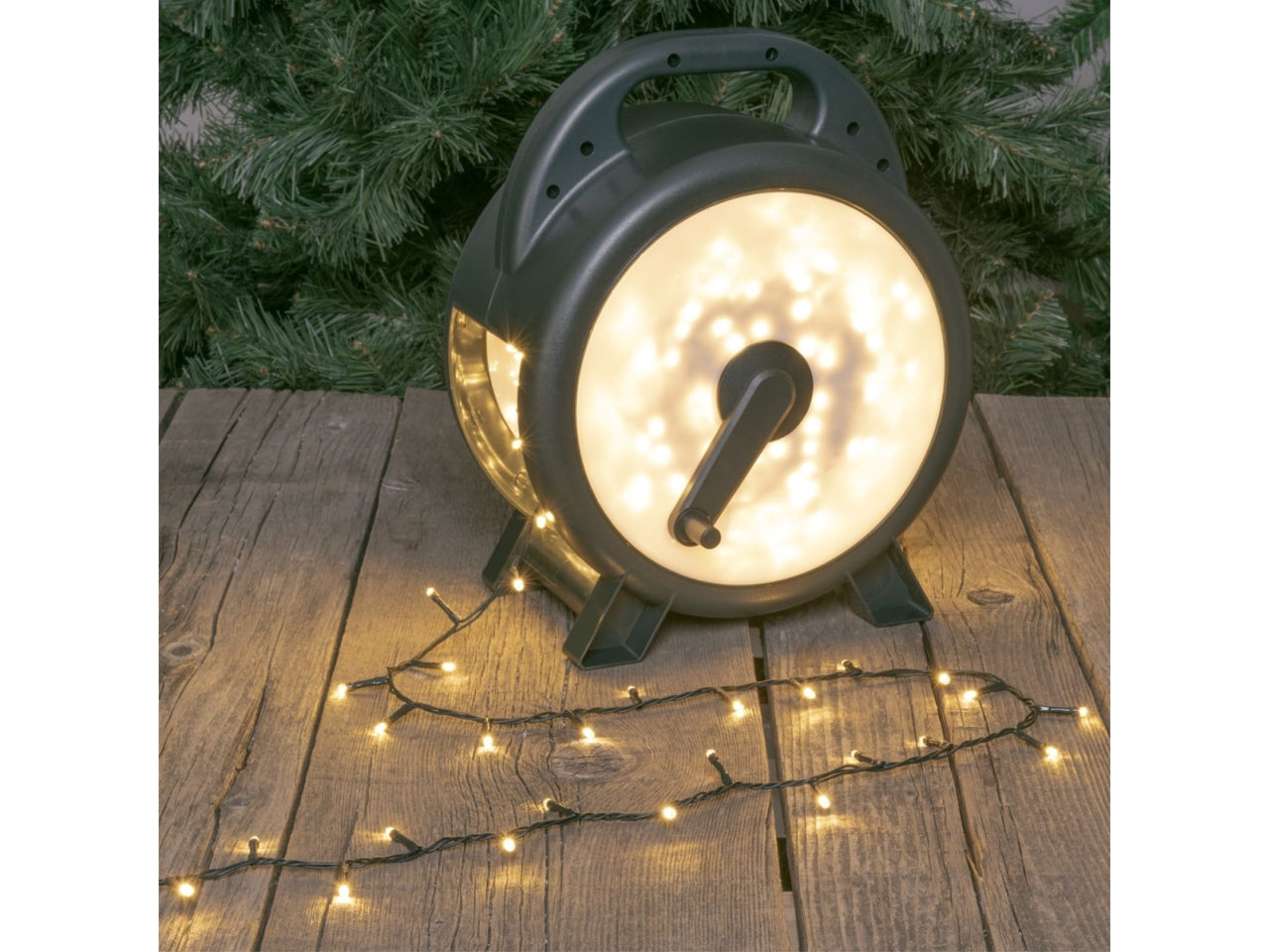 Catena di luci con avvolgitore 60m con 1500 led bianco caldo esterno/interno, cavo verde - XmasKing