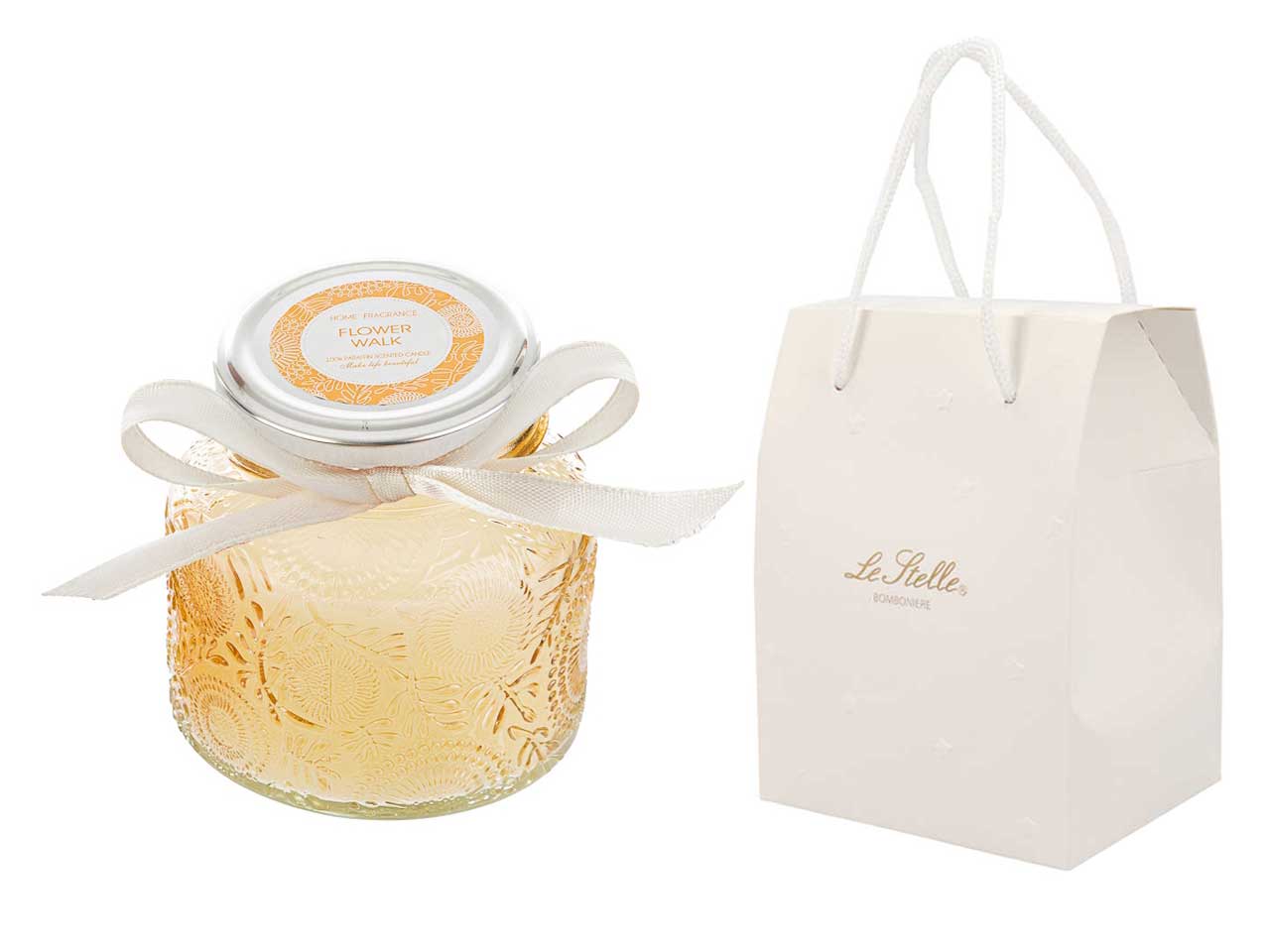 Candela profumata cannella e pepe bianco, vasetto in vetro decorato a rilievo ambra con shopper avorio, d.9xh.8 cm - Le Stelle