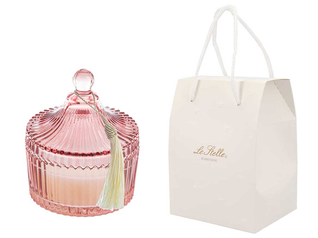 Candela profumata magnolia e fresie, vasetto in vetro decorato a rilievo rosa con shopper in cartone avorio, 6,5xh.9 cm - Le Stelle