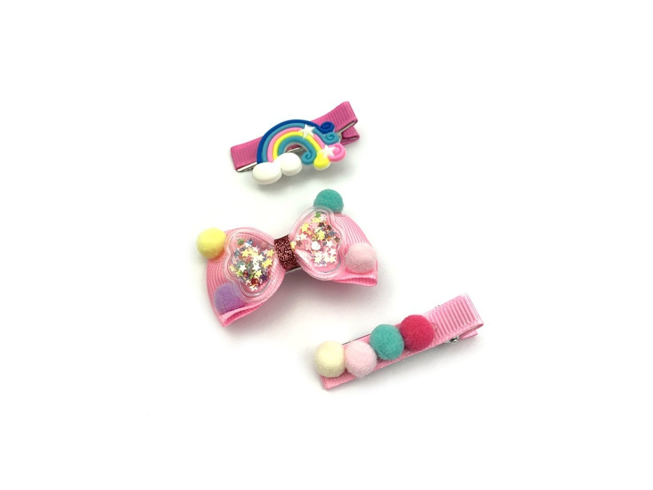Becchetto con 3 soggetti assortiti ponpon, arcobaleno, fiocco in pvc