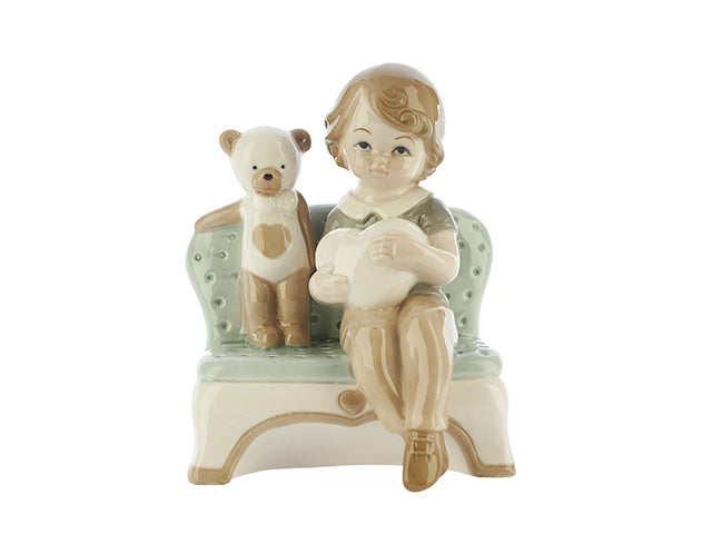 Bimbo su poltrona c/orset.18,5cm1185109