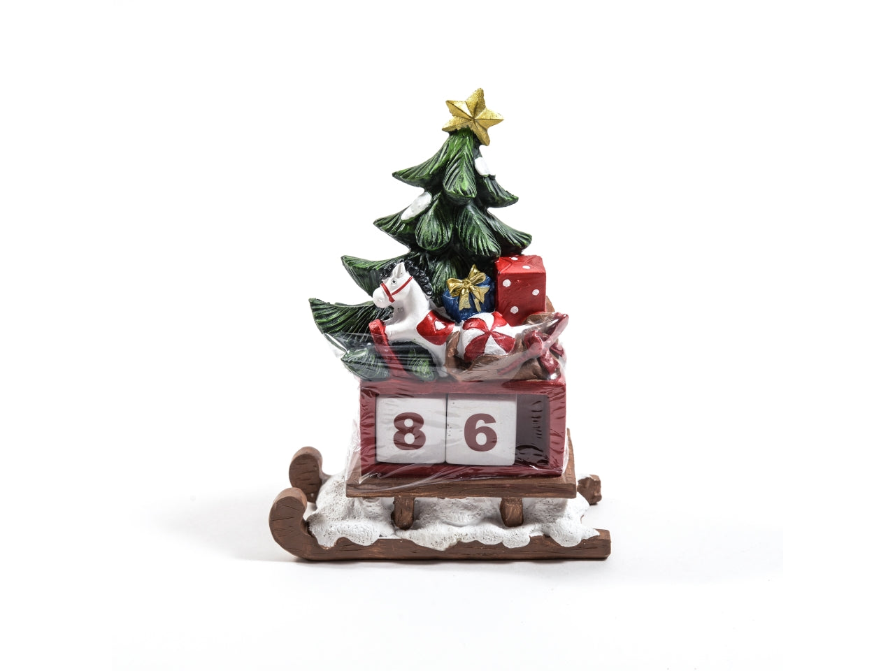 Calendario perpetuo slitta con albero in resina 14x6,5xh.19cm