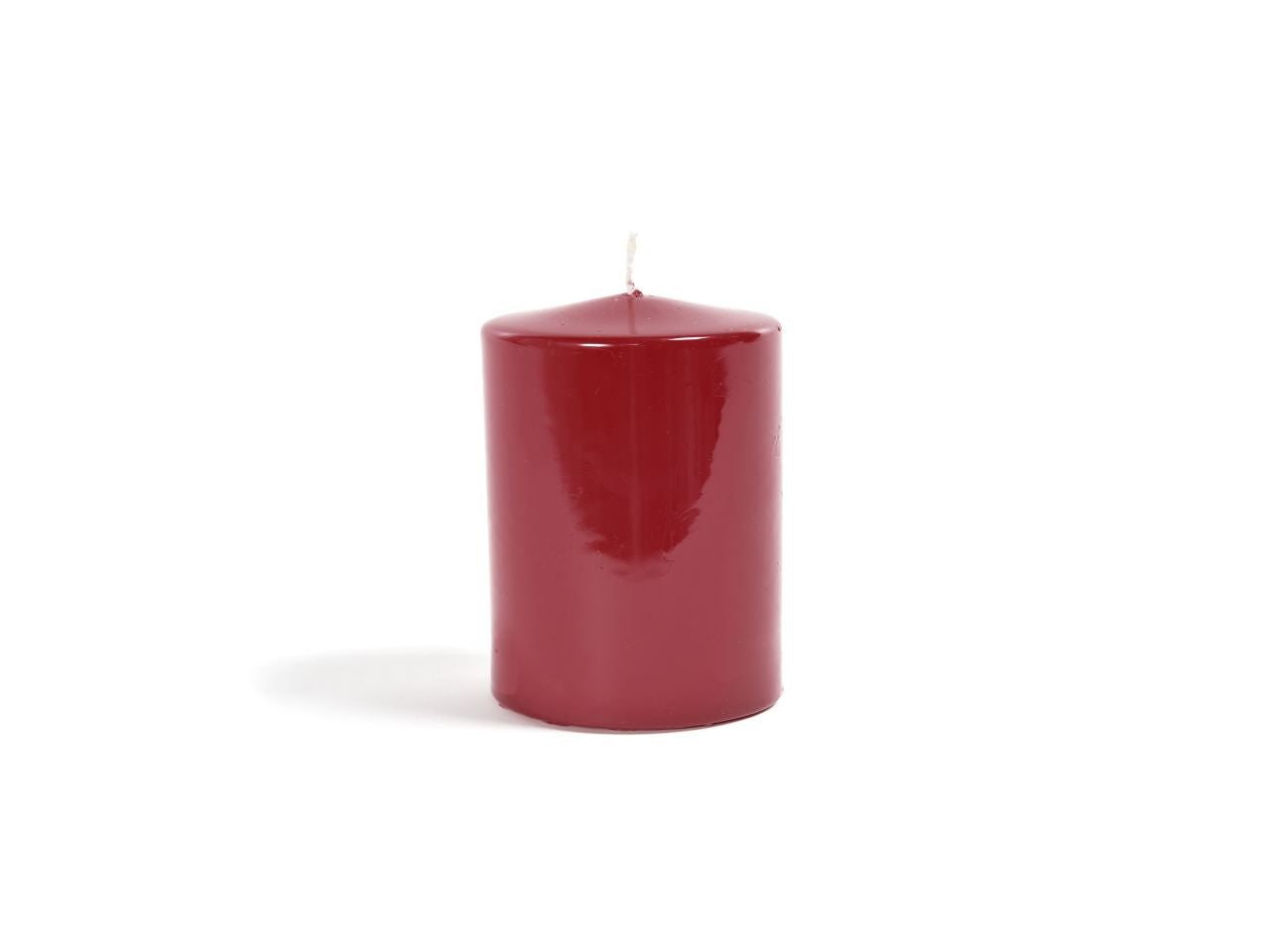 Candela natalizia pillar linea lucid colore bordeaux misura h.10xd.8cm in scatola bianca