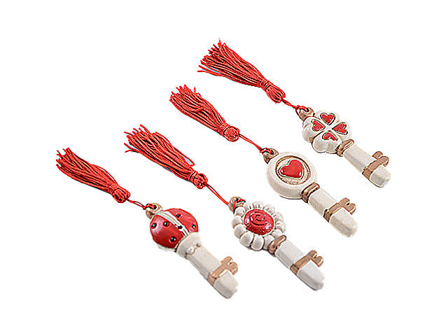 chiave c/nappina 7,5x3cm rossa xb116/r $