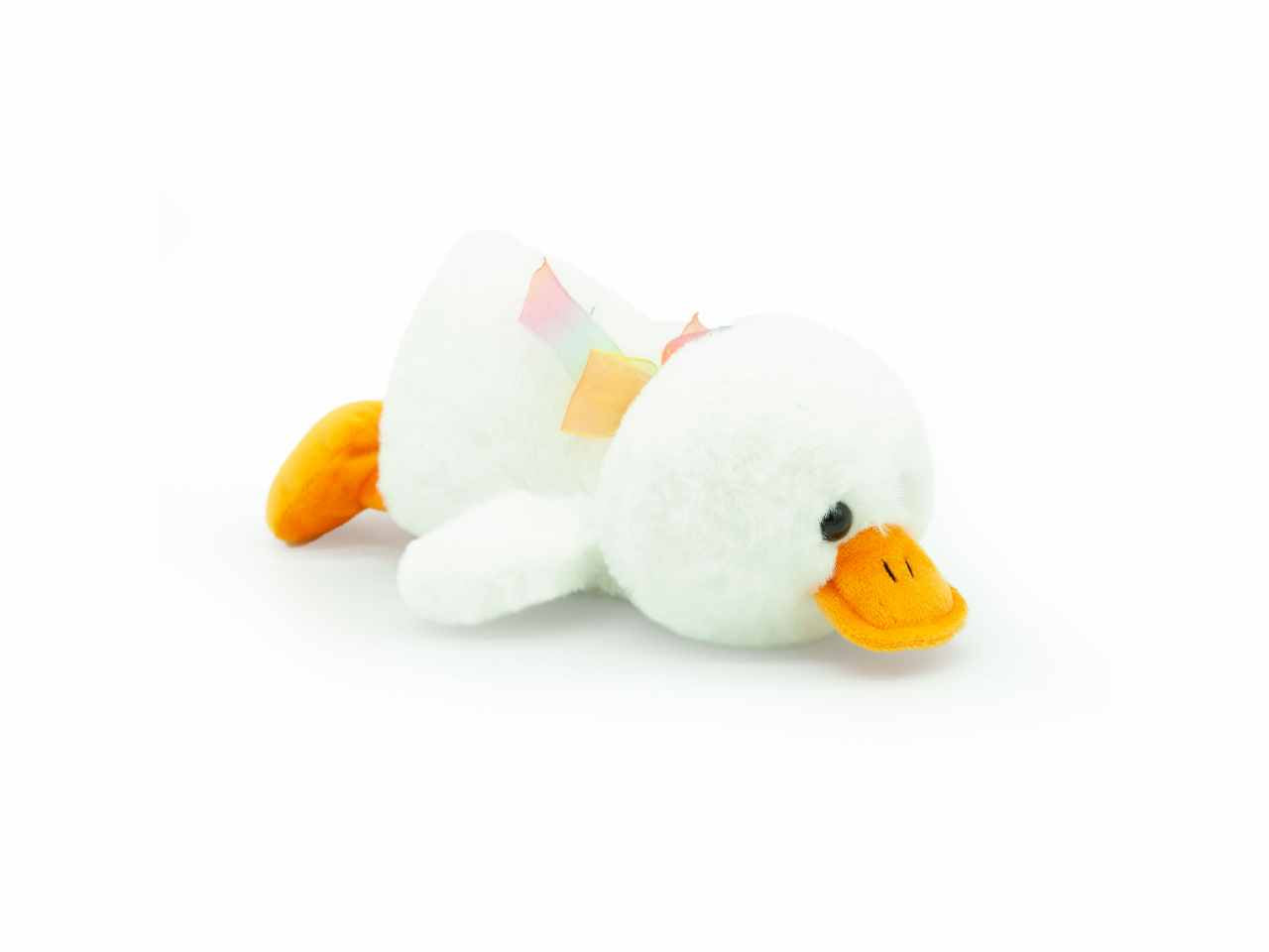 peluche papero steso con fiocco l.30cm 4 colori assortiti