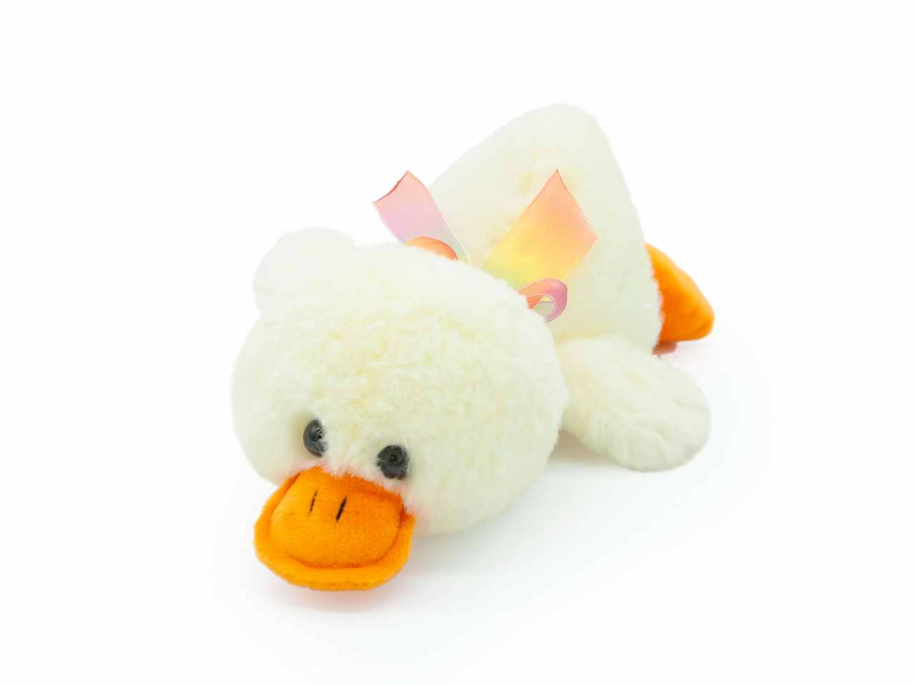 peluche papero steso con fiocco l.30cm 4 colori assortiti