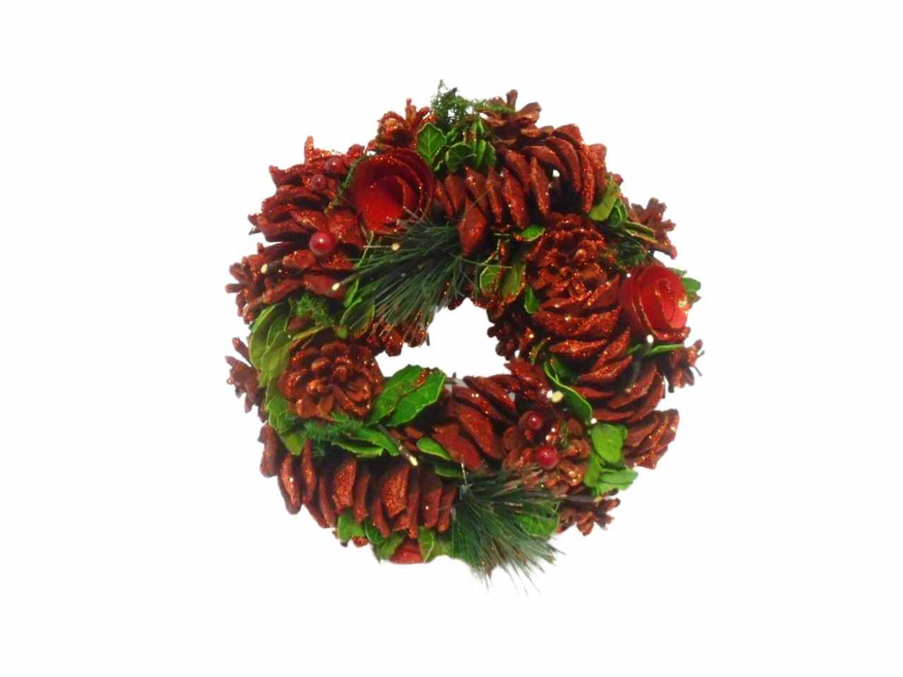 Corona verde c/pigne,fiori,bacche rosse glitterate i mis. d.25cm