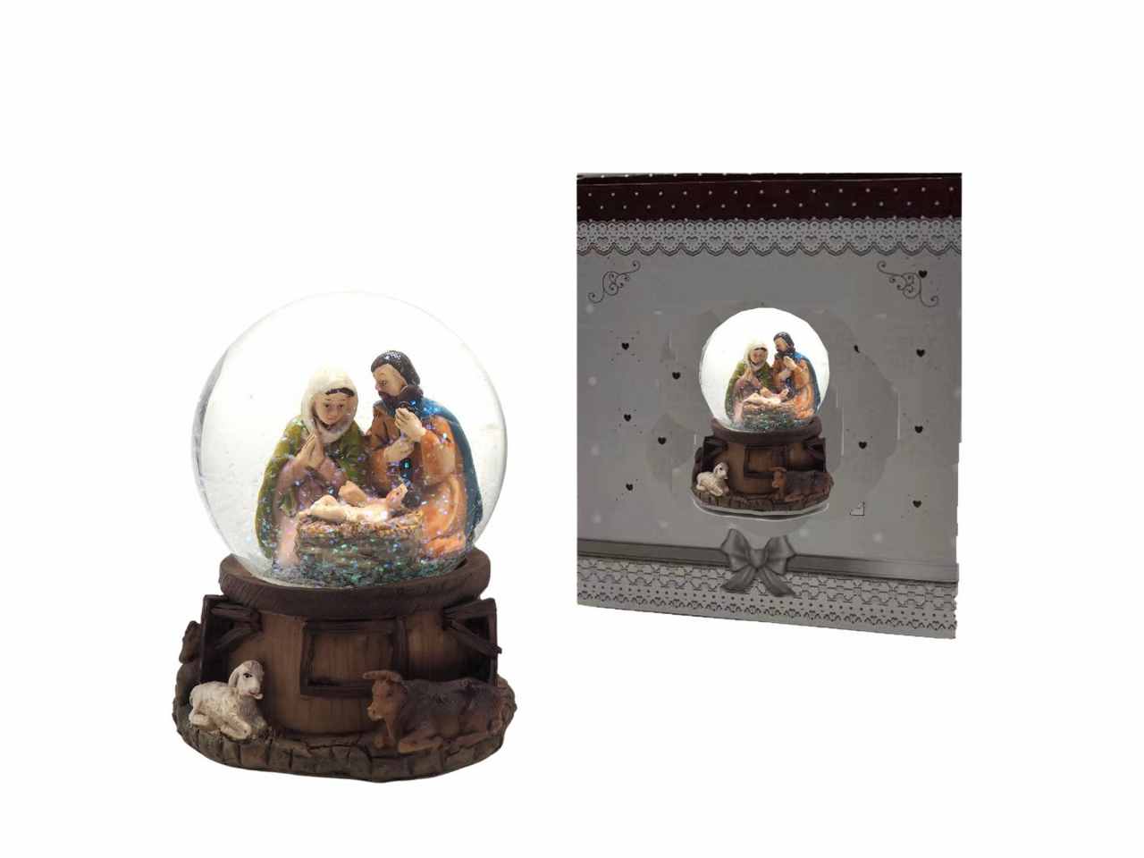Palla c/acqua base resina c/nativita' int. d.10cm c/carillon
