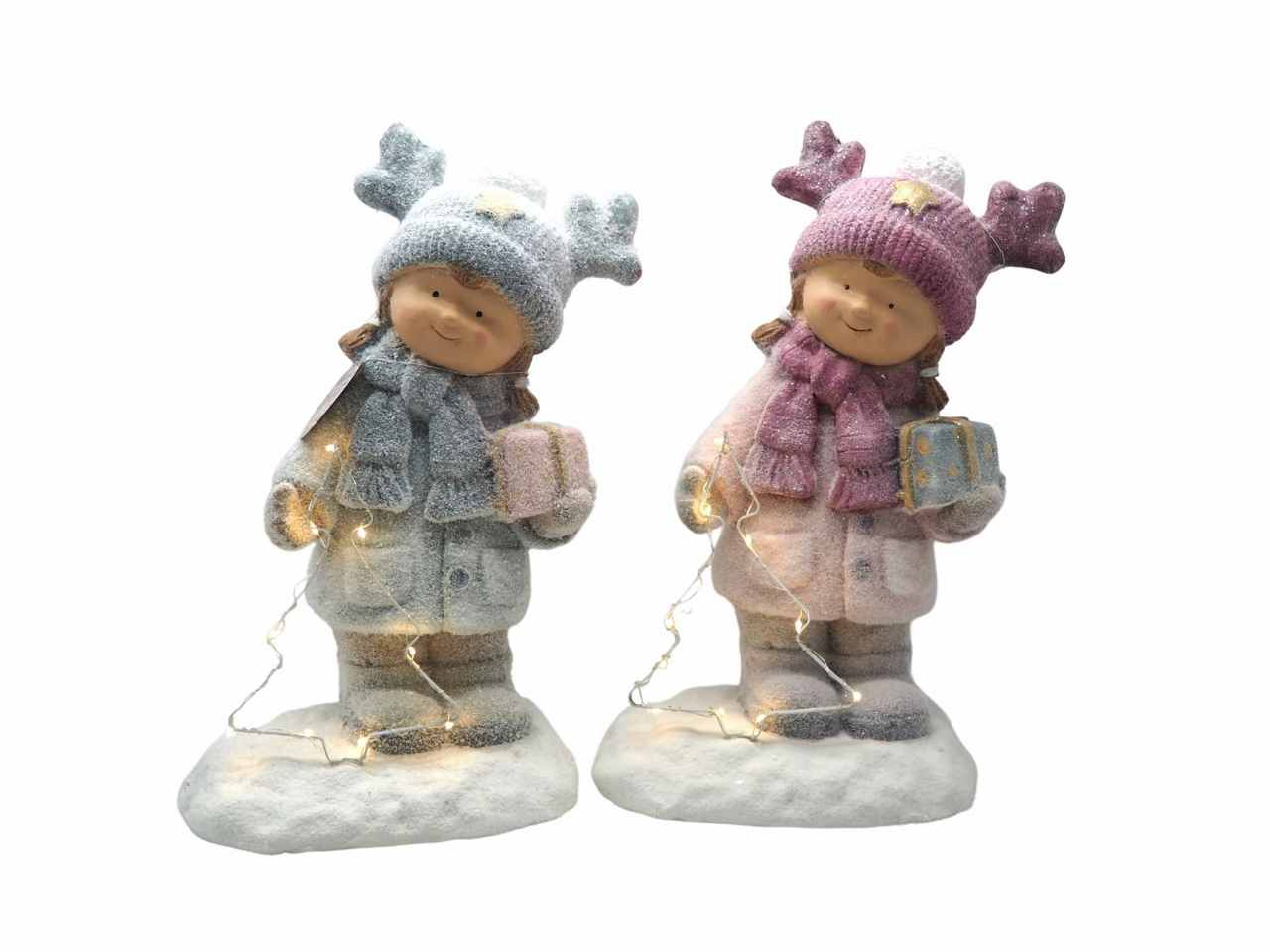 Bambina in piedi magnesia c/regalo+albero c/luce calda nuovo colore