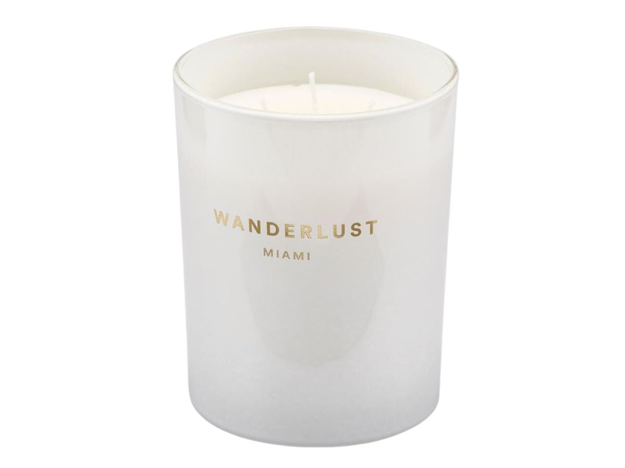 Candela profumata wanderlust miami 470gr altezza 12,5cm diametro 10cm fragranza al pompelmo cassis con 3 stoppini e scatola regalo